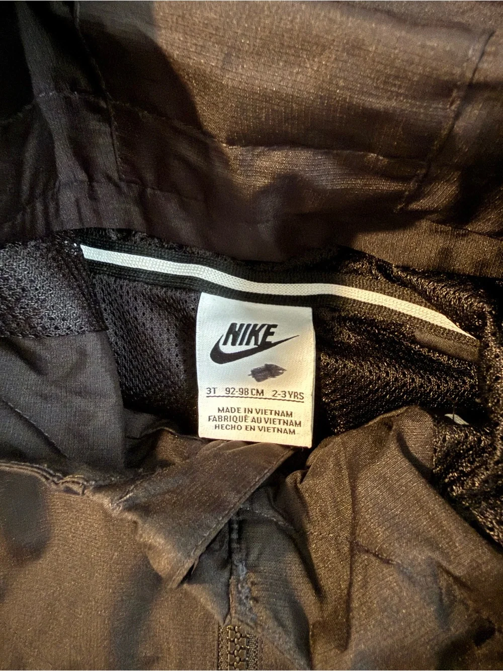 Nike Black Hooded Kids Rain Jacket with White Logo